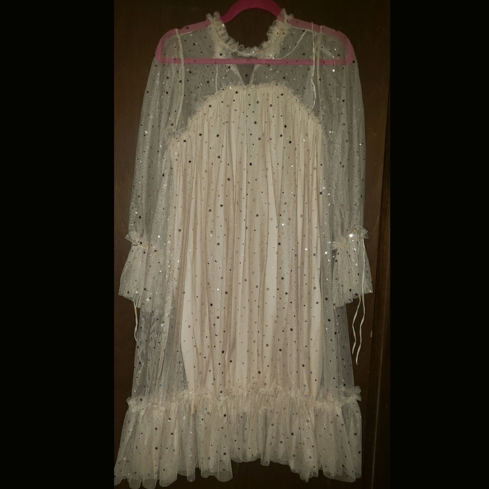 Sheer lined dress with silver stars